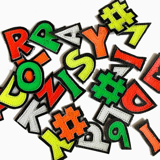 Lettere Numeri e caratteri in Pelle mini h.35mm per tuta da cucire o incollare a tute moto