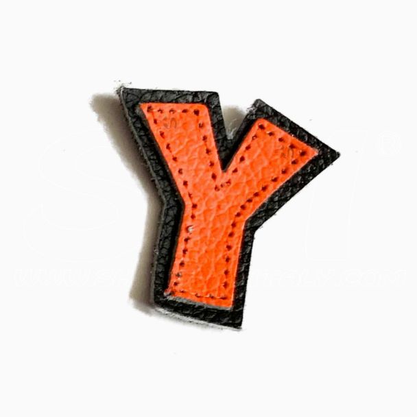 
Lettere Numeri e caratteri in Pelle mini h.35mm per tuta da cucire o incollare a tute moto	Arancio Fluo